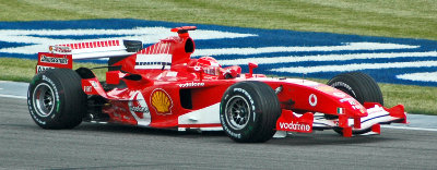 Schumacher_%28Ferrari%29_in_practice_at_USGP_2005[1].jpg